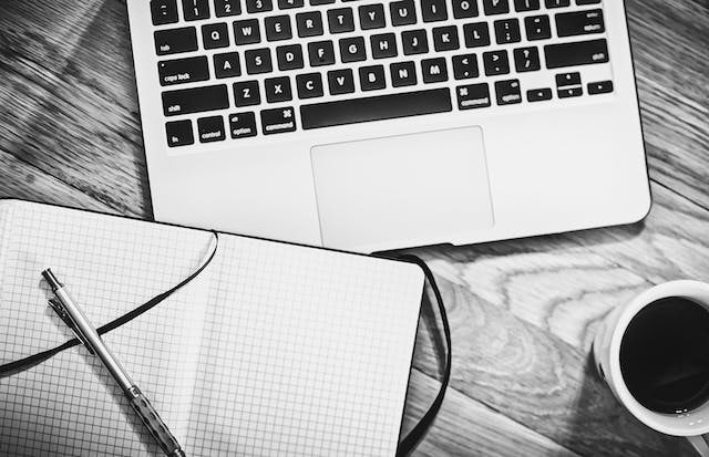 A planner and laptop